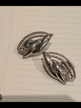 Trifari Shiny Silver-Tone Twisted Leaf Clip Earrings